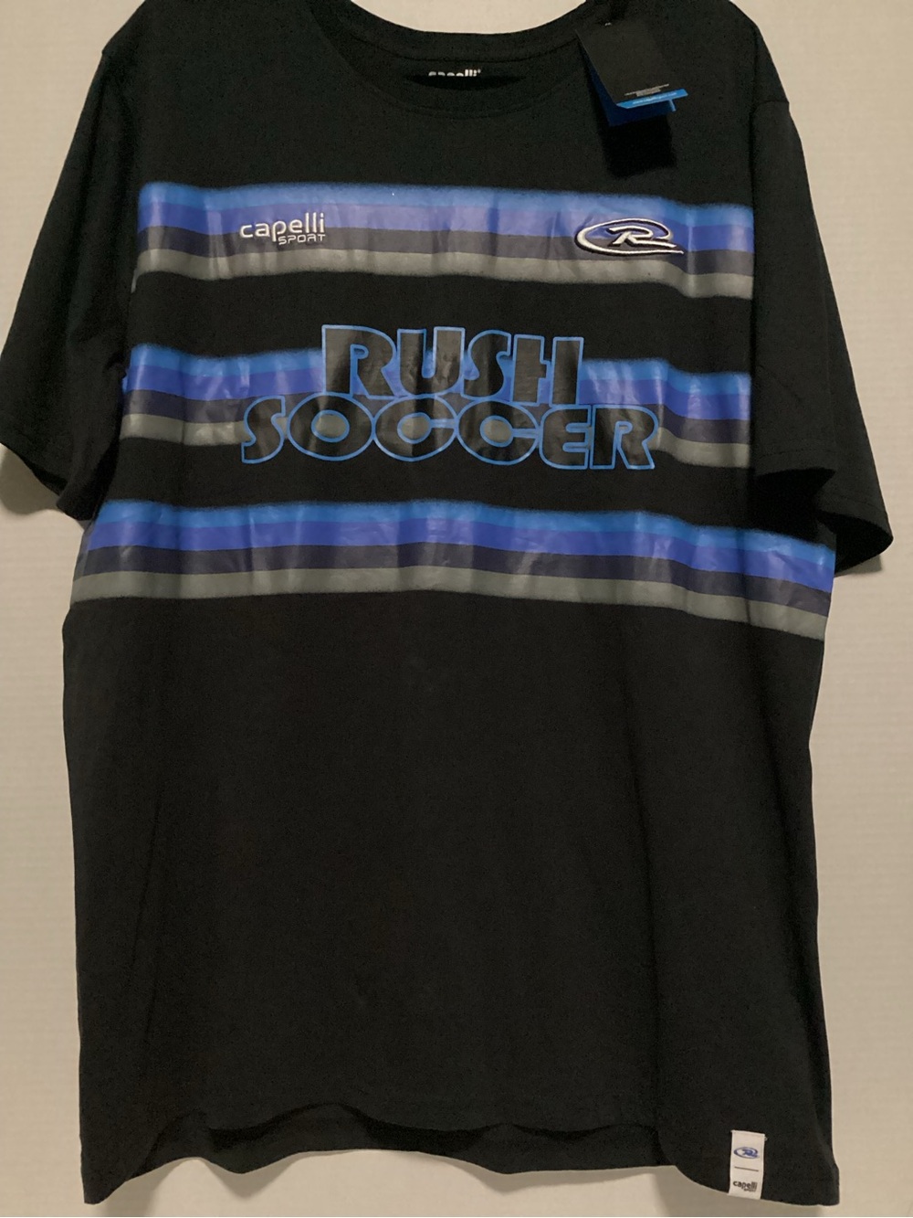 Capelli of New York Black Tee with Blue Stripes - Rush Soccer Graphic